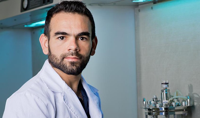 Daniel Jocobo-Velázquez. a young man wearing a lab coat, is an expert in food security