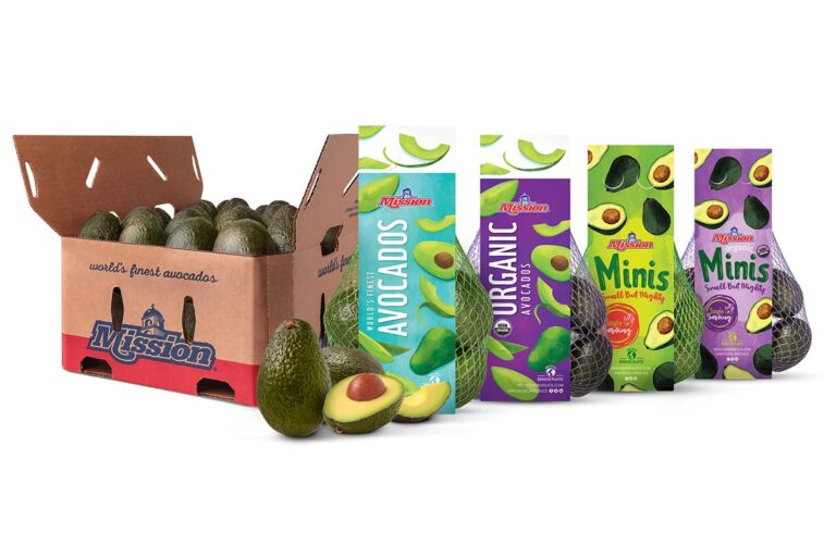 A cardboard box of avocado and three bags of avocados sit next to each other against a white background
