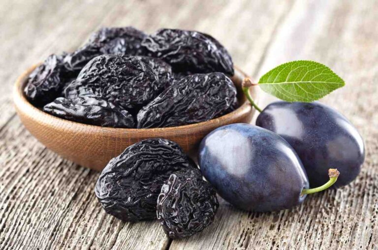  Prunes-for-osteoporosis-in-wooden-plate