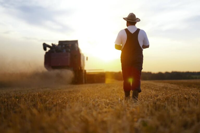 Farm share drops showing farmer in the middle of harvest